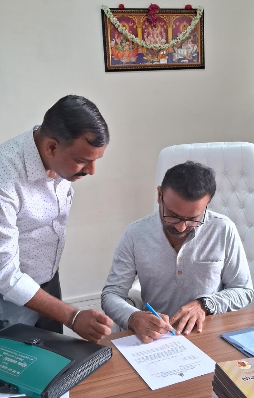 With Labour Minister Santosh Lad Sir